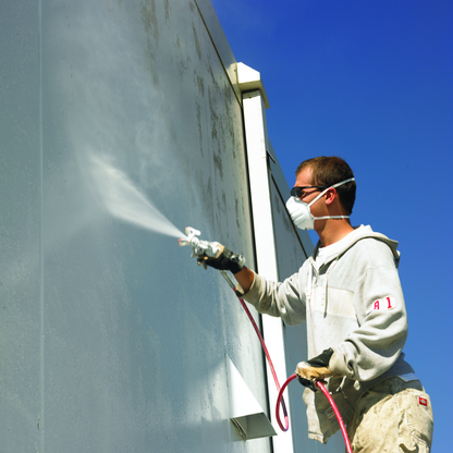 Application de peinture airless sur mur extérieur avec pistolet de pulvérisation