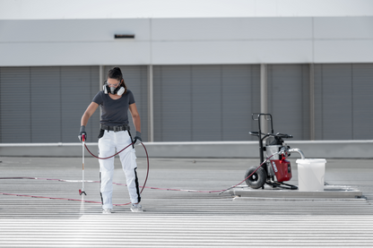 Rallonge Titan pour pistolet de peinture airless utilisée pour des travaux de peinture extérieure