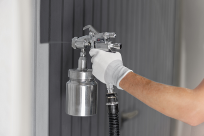 Travaux de laquage avec le système HVLP Titan Capspray X80